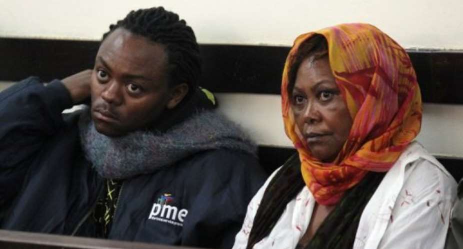 Susan Soila (R), of the Amboseli Trust for Elephants, and her son Robert Ntawasa, appear May 13, 2013 in a Nairobi court.  By Simon Maina (AFP)