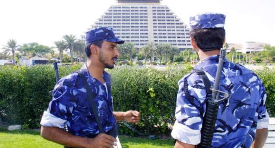 Qatari police special forces patrol in Doha November 13, 2001.  By Patrick Baz AFPFile