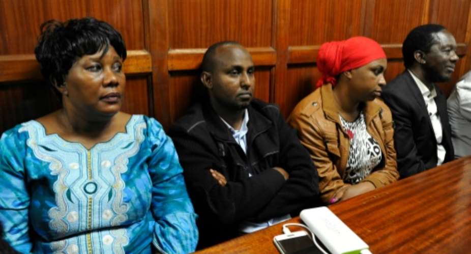 L to R Kenyan politicians Florence Mutua, Junet Mohammed, Aisha Jumwa, and Timothy Bosire sit in the dock at the Milimani Law Courts, in Nairobi on June 17, 2016 as they are charged with hate speech and incitement to violence.  By Simon Maina AFP