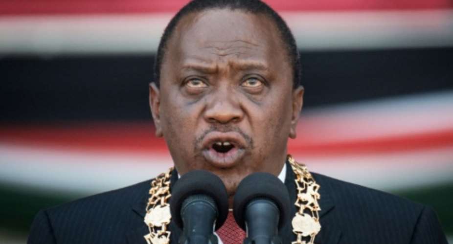 Kenyan President Uhuru Kenyatta has said the proposed constitutional changes would help end repeated cycles of election violence.  By YASUYOSHI CHIBA AFPFile