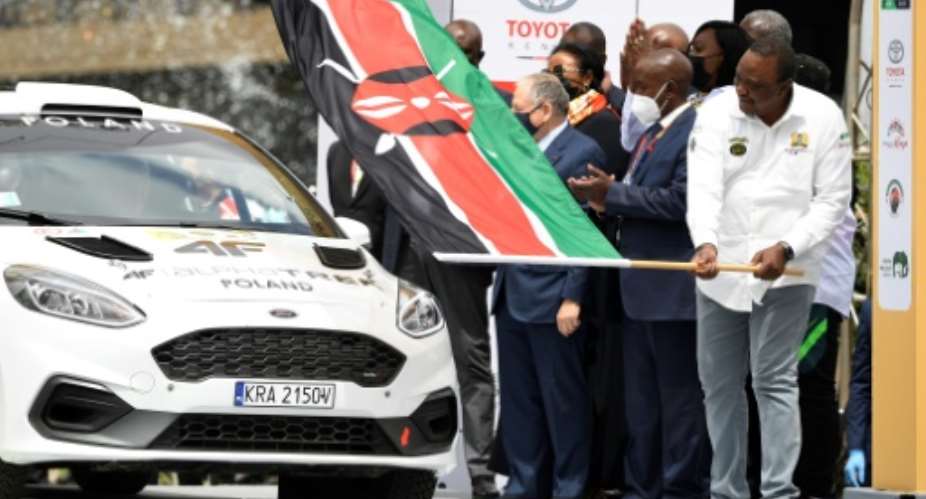 Kenyan President Uhuru Kenyatta R started the rally.  By TONY KARUMBA AFP