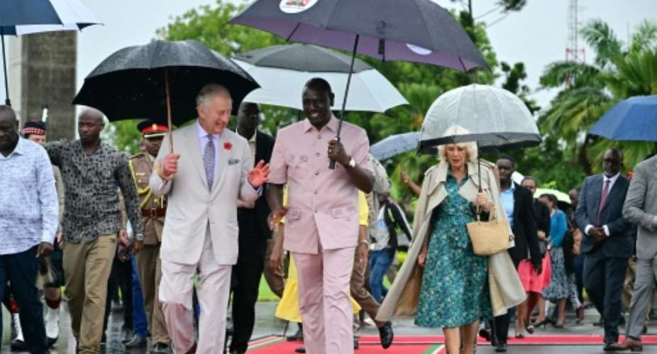 Kenyan President William Ruto wears a safari-style suit as he bade farewell to King Charles III and his wife Queen Camilla earlier this month.  By Ben Stansall POOLAFPFile