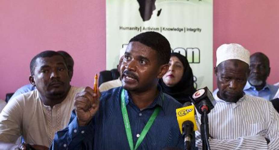 Hussein Khalid, director of the HAKI Africa human rights group, talks during a press conference condemning the killing of cleric Abubakar Shariff -- a.k.a. Makaburi -- in the coastal city of Mombasa, on April 2, 2014.  By Ivan Lieman AFPFile