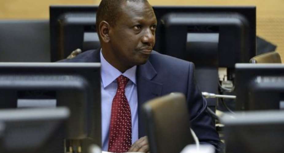 Kenyas William Ruto looks on during a trial hearing at the International Criminal Court, on May 14, 2013.  By Lex van Lieshout (ANP/AFP)