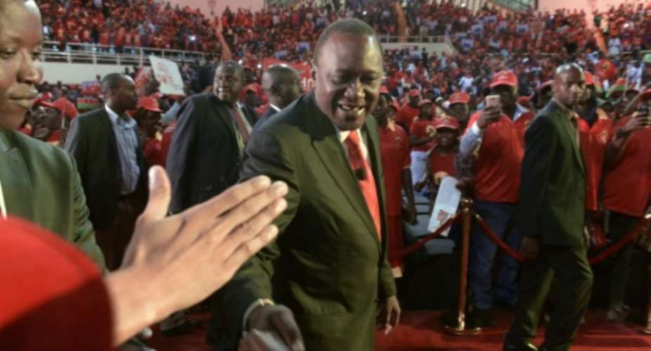 Kenya's President Uhuru Kenyatta is gearing up for a tight race against longtime rival Raila Odinga in August elections with five million new voters registered to take part.  By SIMON MAINA AFP