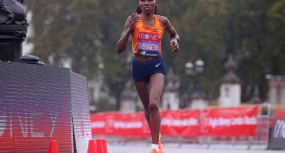 Kenya's Ruth Chepngetich sliced almost half a minute off the previous best mark of 1hr 4:31.  By JOHN SIBLEY POOLAFP