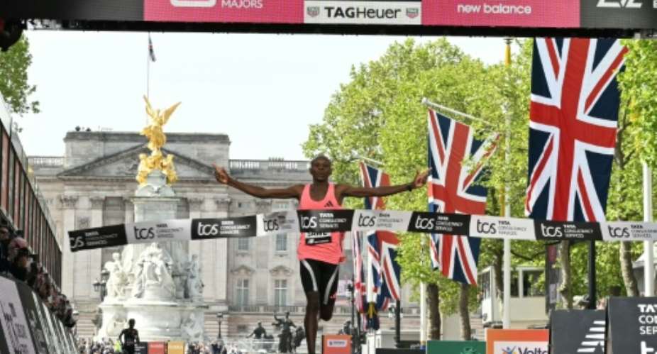 Kenyas Sabastian Sawe wins the London Marathon in a new world record time.  By JUSTIN TALLIS (AFP)