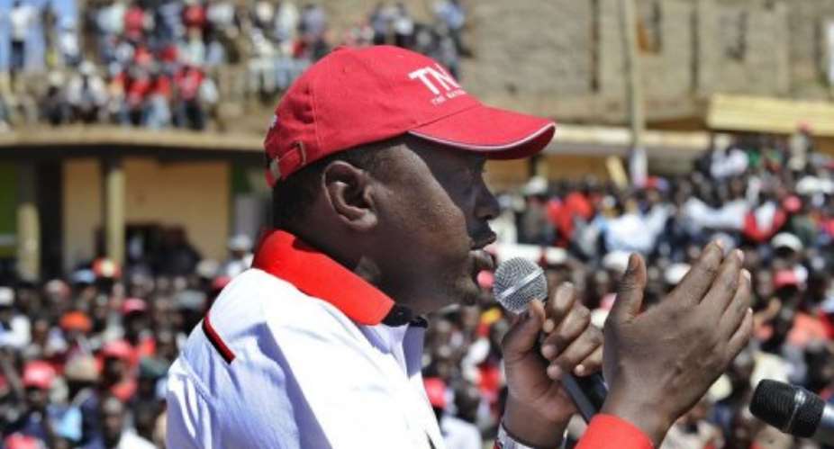Kenya presidential candidate Uhuru Kenyatta, shown on February 23, is facing charges of crims against humanity.  By Tony Karumba AFP