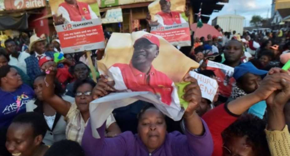 Kenyatta's supporters celebrated his win in October -- but the election's outcome only deepened Kenya's division.  By SIMON MAINA AFPFile