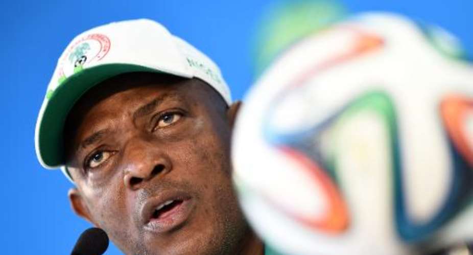 Nigeria's coach Stephen Keshi answers a question during a press conference at The Beira-Rio Stadium in Porto Alegre on June 24, 2014, before a training session.  By Jewel Samad AFPFile