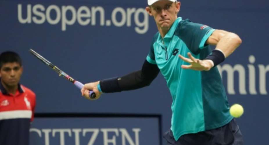 Kevin Anderson of South Africa hits a return to Sam Querrey of the US during their 2017 US Open Men's Singles quarter finals match at the USTA Billie Jean King National Tennis Center in New York on September 5, 2017.  By DON EMMERT AFPFile