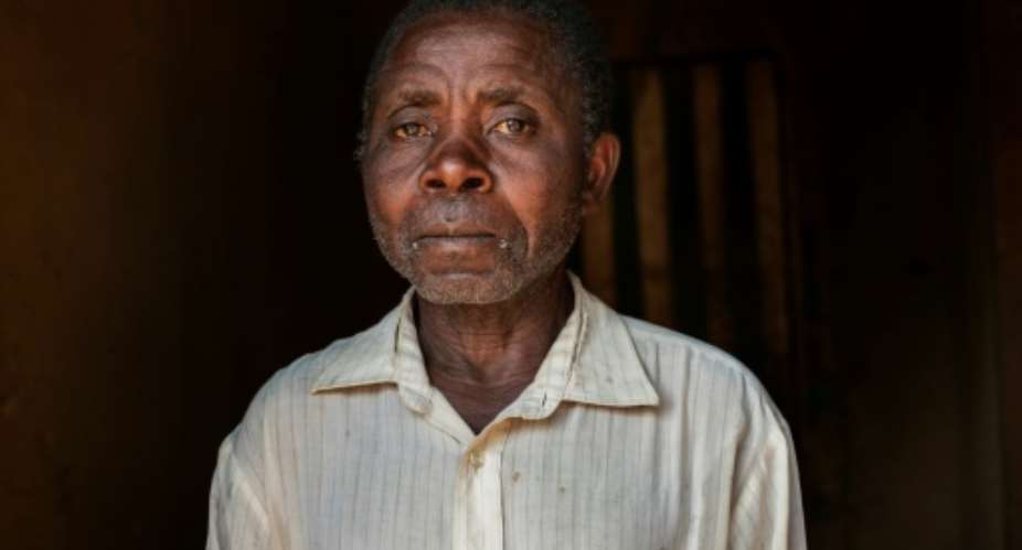 Congolese subsistence farmer Floribert Kambale Safari pictured at his home in Kayna, eastern DR Congo, was a victim of kidnapping for ransom.  By Eduardo Soteras AFP