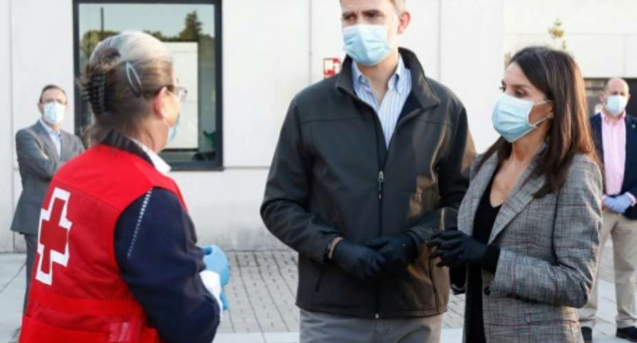 King Felipe VI and Queen Letizia of Spain donned face masks to speak to citizens as the prime minister announced the resumption of tourism and football.  By Handout Casa de S.M. el ReyAFP