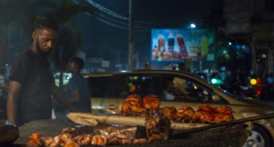 Kinshasa has been dependent on imported frozen chicken for years -- there isn't enough local produce to sustain this bustling, 12-million-strong city.  By ARSENE MPIANA AFP