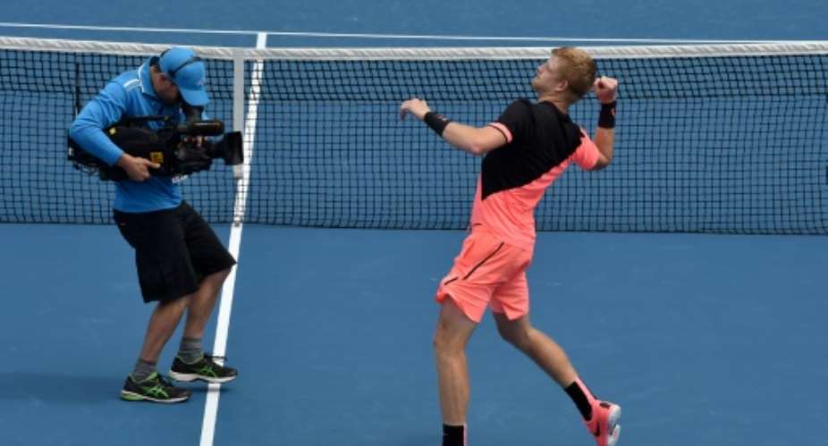 Kyle Edmund, the only British man in the main draw after Andy Murray's injury withdrawal, toughed out a 6-7 47, 6-3, 3-6, 6-3, 6-4 win over South Africa's Kevin Anderson at the Australian Open.  By PAUL CROCK AFP