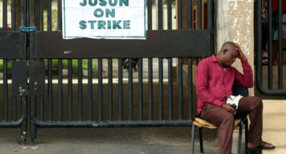 Labour unions have called for strikes to demand a better minimum wage.  By Kola Sulaimon (AFP)