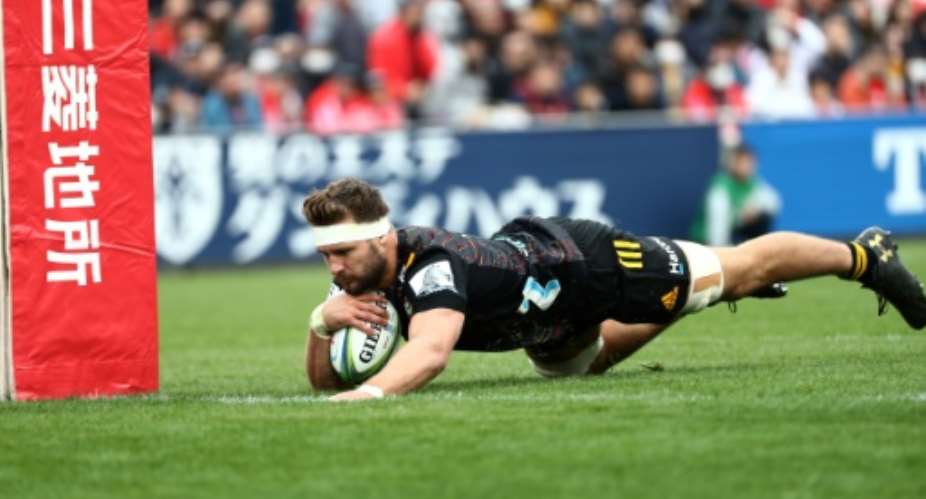 Lachlan Boshier scores a try for the Chiefs during their Super Rugby match against the Sunwolves.  By Behrouz MEHRI AFP