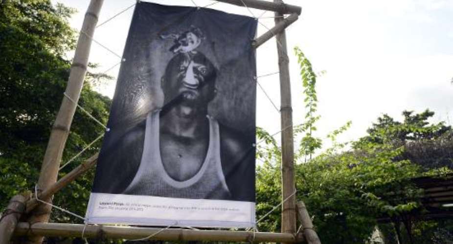 A picture of a local rapper by Belgian photographer Leonard Pongo is diplayed on November 13, 2014 in Freedom Park during annual festival LagosPhoto.  By Pius Utomi Ekpei (AFP/File)