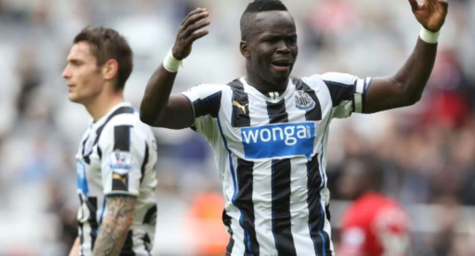 Late Ivory Coast midfielder Cheick Tiote right in action for Newcastle United in 2013.  By Ian MacNicol, Ian MacNicol AFPFile