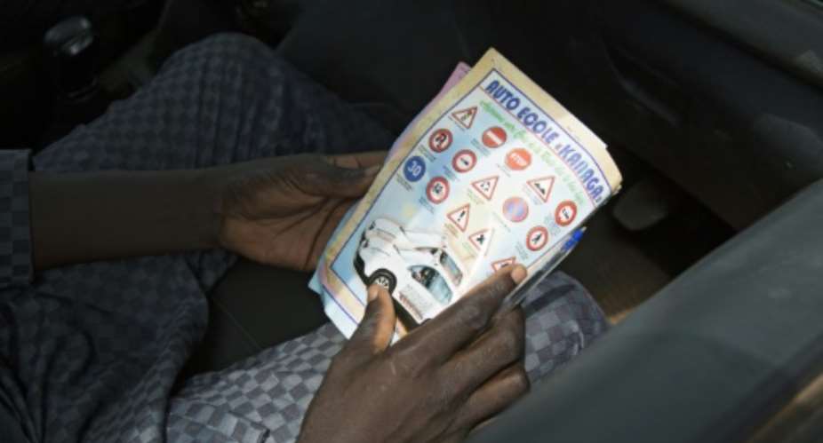 Le code de la route: Road signs in Mali are in French, part of the countrys colonial legacy.  By ANNIE RISEMBERG (AFP)