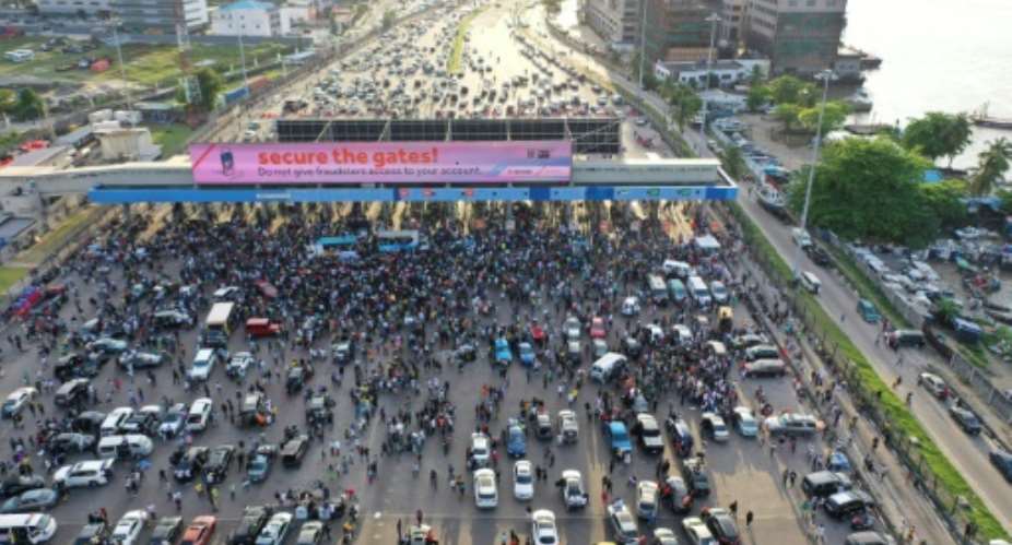 Lekki Toll Gate had become a place of protest, partying and prayers as thousands of mainly young people blocked one of the main highways in Lagos.  By Pierre FAVENNEC AFPFile