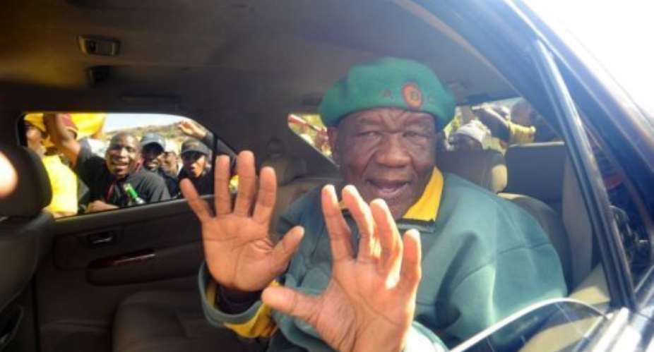Thomas Thabane, leader of All Basotho Convention, greets supporters in Maseru on May 27.  By Alexander Joe AFPFile