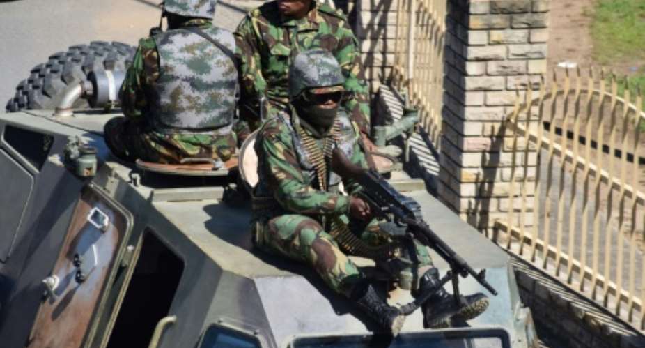 Lesotho troops patrol the Maseru on Saturday after embattled prime minister Thomas Thabane deployed them to restore order, accusing unnamed law enforcement agencies of undermining democracy. But the army had returned to barracks by Sunday..  By Molise MOLISE AFP
