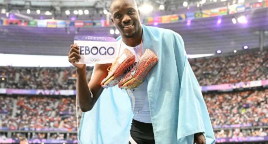 Letsile Tebogo is the first ever African winner of the mens 200 metres at an Olympics.  By Jewel SAMAD (AFP)