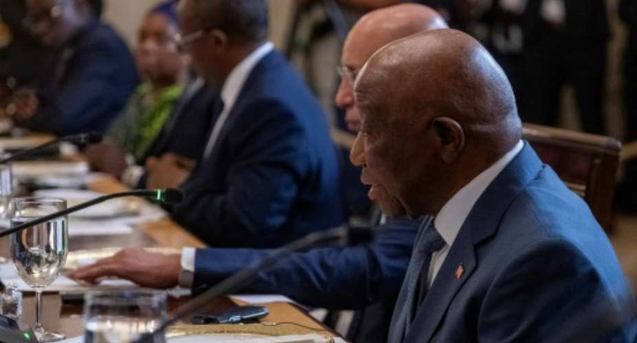 Liberian leader Joseph Boakai appeared embarrassed by US President Donald Trumps gaffe.  By Jim WATSON (AFP)