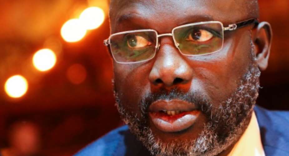 Liberian President George Weah had promised to fight corruption.  By ludovic MARIN POOLAFPFile