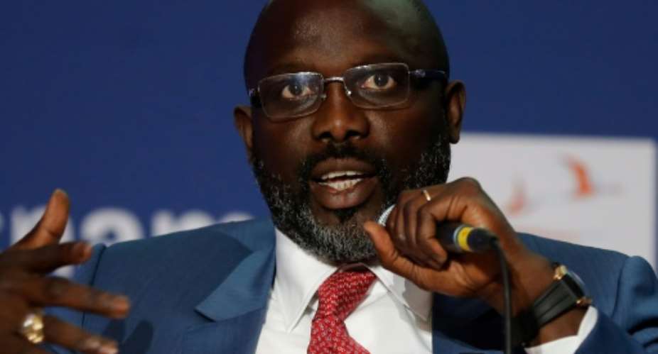 Liberian President George Weah spoke at a conference on education in Paris on the first day of his official visit to France..  By FRANCOIS GUILLOT AFP