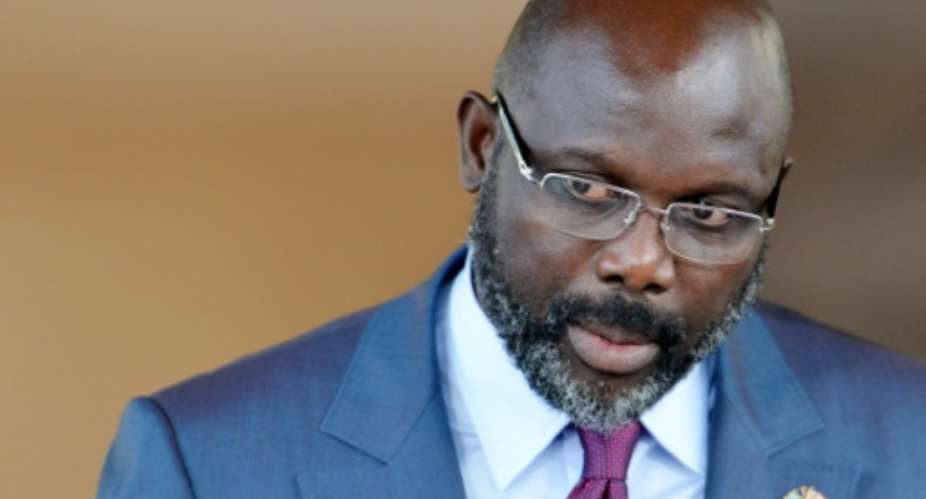Liberian President George Weah, who took office in January, has made land reform a cornerstone of his programme.  By SIA KAMBOU AFP