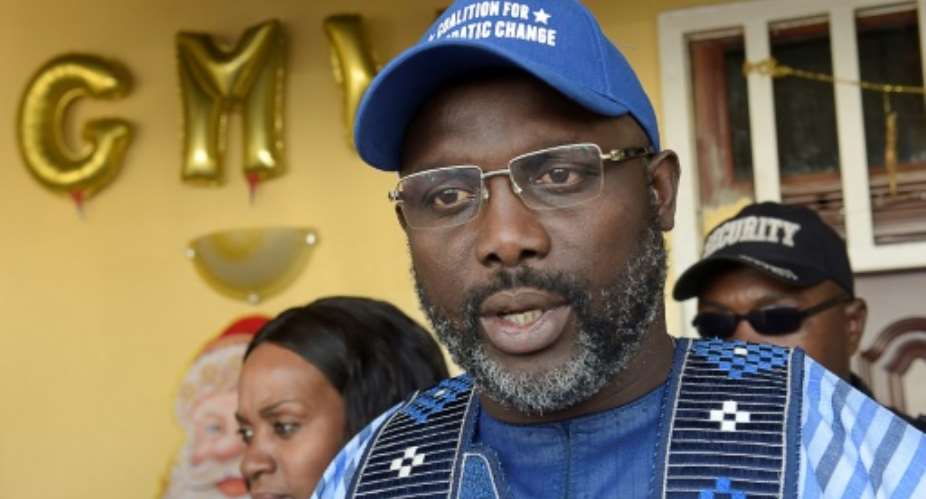 Liberian presidential candidate and ex-football star George Weah is idolised in his country as 'Mister George'.  By SEYLLOU AFPFile
