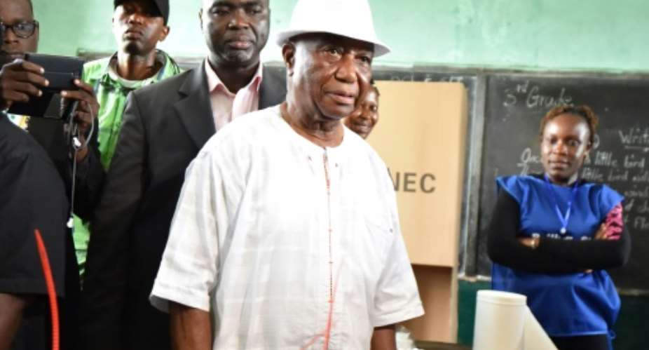 Liberian Vice President and presidential candidate Joseph Boakai at a polling station in Monrovia during presidential and legislatives elections on October 10, 2017..  By ISSOUF SANOGO (AFP)