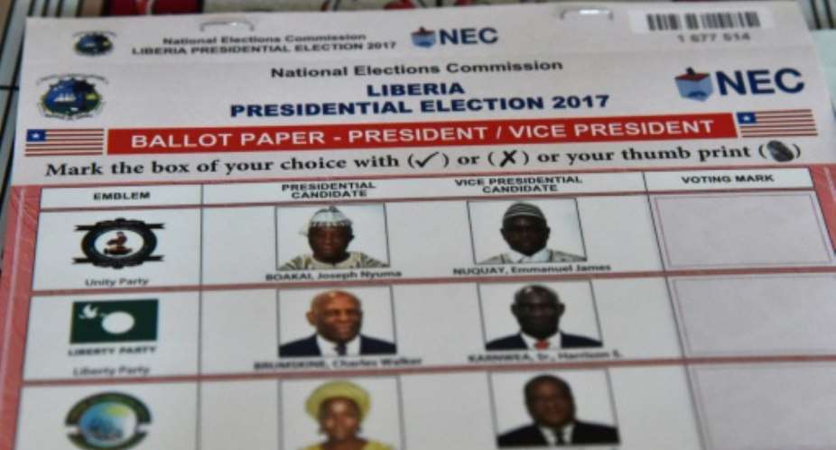 Liberia's election on October 10, 2017 was described as free and fair by international and domestic observers, despite some reported delays.  By ISSOUF SANOGO AFPFile