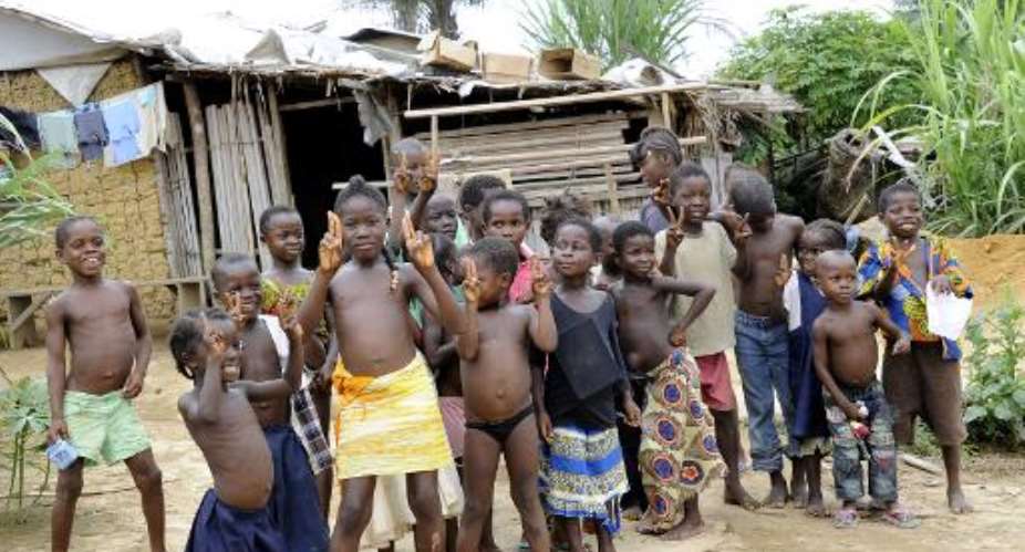 Refugee children who were born in Liberia pictured at the PTP refugee camp in Grand Gedeh county.  By Zoom Dosso AFP