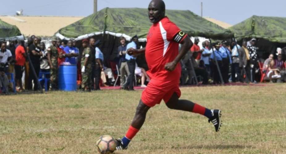Liberia's new president and former football star George Weah will visit France next week.  By ISSOUF SANOGO AFPFile