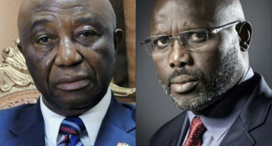 Liberias Vice President Joseph Nyumah Boakai (l) and former football star George Weah will go head-to-head in a secopnd round vote on November 7 -- a crucial test of the countrys stability.  By Zoom DOSSO, JOEL SAGET (AFP/File)