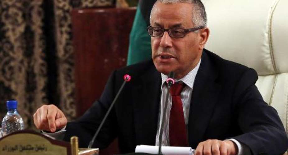 Libyan Prime Minister Ali Zeidan speaks during a press conference in Tripoli on October 30, 2013.  By Mahmud Turkia AFPFile
