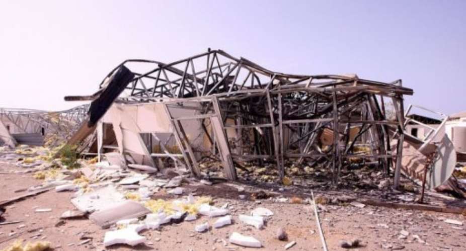 Libyan government officials say this building was damaged in an airstrike on Zliten.  By Imed Lamloum (AFP)