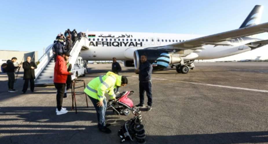 Libyan airline Afriqiyah Airways resumed flights from Tripoli's Mitiga airport after months of suspension on December 12.  By Mahmud TURKIA AFP