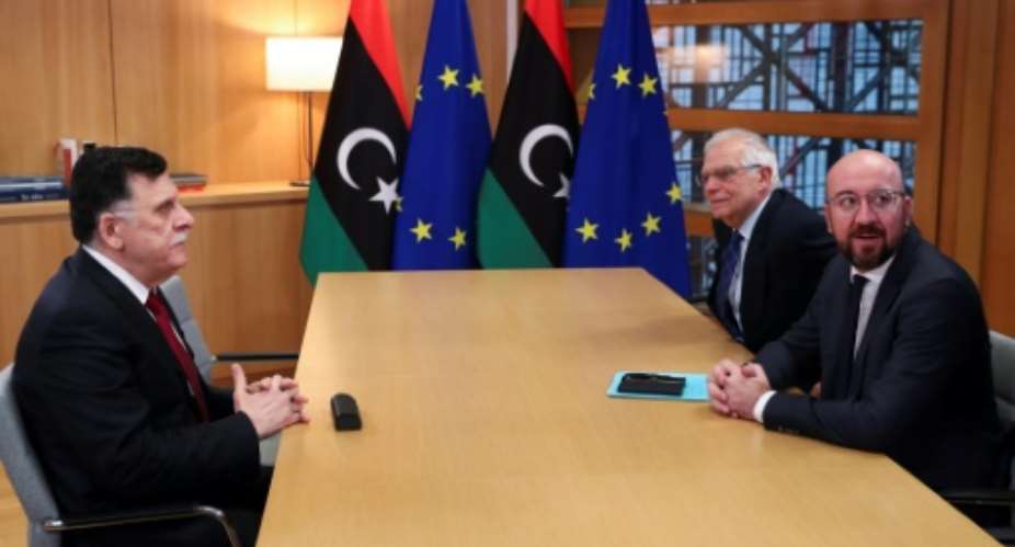 Libyan Prime Minister Fayez Al-Sarraj met with European Council President Charles Michel R and EU foreign policy chief Josep Borrell C with Borrell warning Libya is facing a watershed point.  By Francisco Seco AP PoolAFP