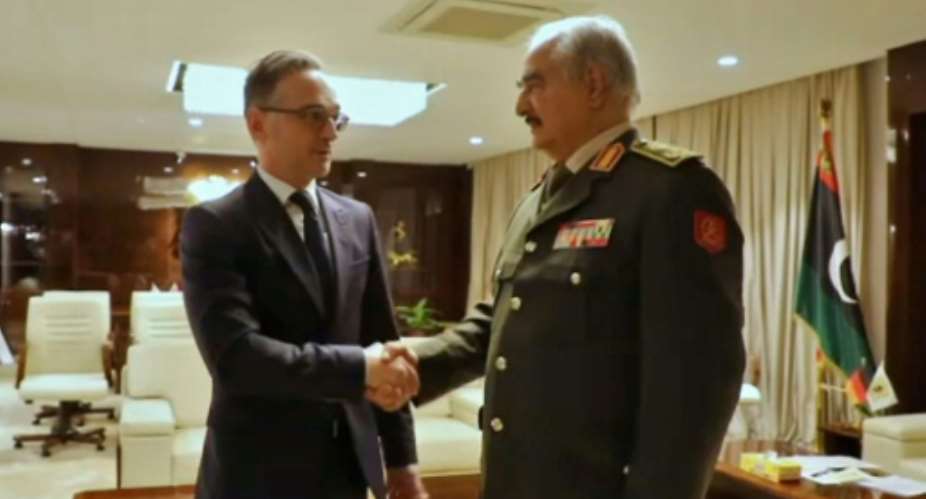 Libyan strongman Khalifa Haftar greets German Foreign Minister Heiko Maas in his eastern stronghold Benghazi.  By - LNA War Information DivisionAFP