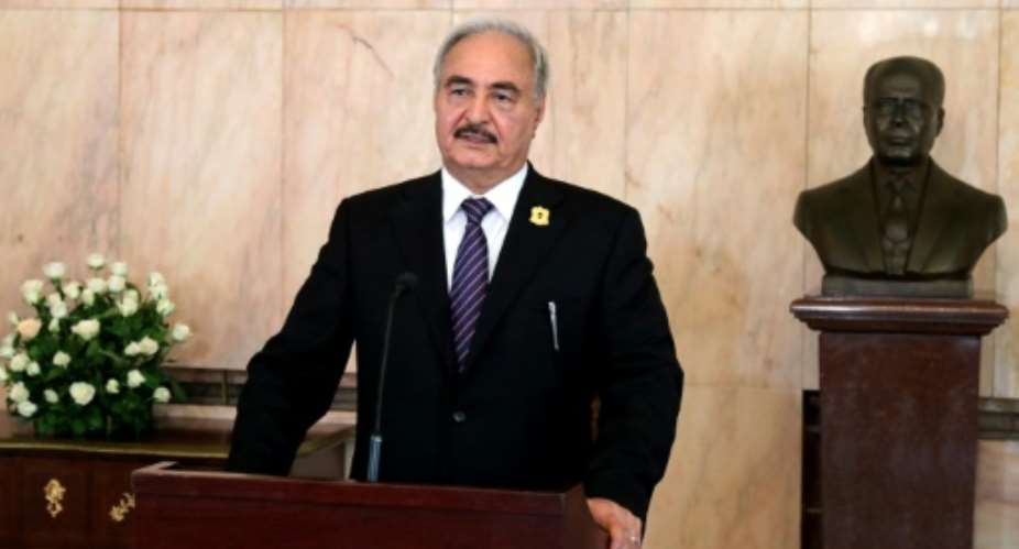 Libyan strongman Khalifa Haftar has called for presidential and parliamentary elections in 2018.  By HO Tunisian PresidencyAFP