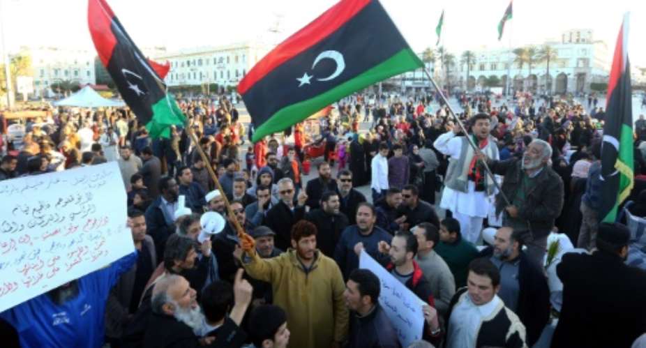 Libyans demonstrate against eastern Libya's strongman Khalifa Haftar and in support of the Islamist-led Benghazi Defence Brigades BDB, on March 10, 2017 in Tripoli.  By MAHMUD TURKIA AFPFile