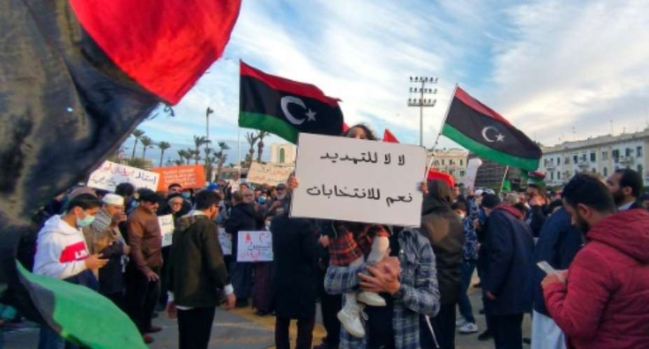 Libyans demonstrate in the capital Tripoli on February 11 to demand elections.  By - (AFP/File)