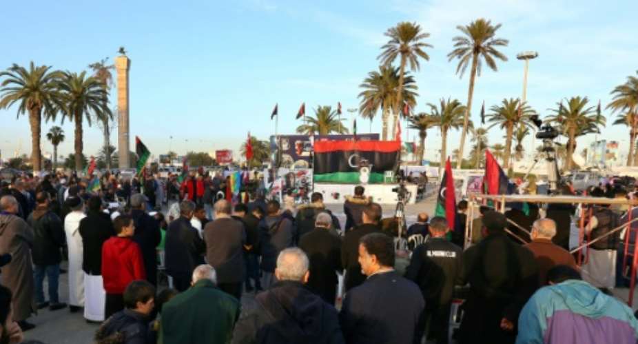 Libyans take part in a demonstration against eastern strongman Khalifa Haftar -- who is backed by France, Russia and others -- and in support of the UN-recognised Government of National Accord GNA, at Martyrs' Square in the GNA-held capital Tripoli.  By - AFPFile
