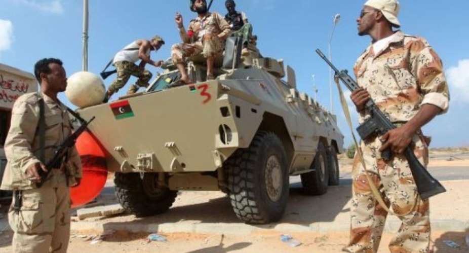 Libyan National Transitional Council NTC fighters are battling to reach the heart of Sirte.  By Ahmad al-Rubaye AFP