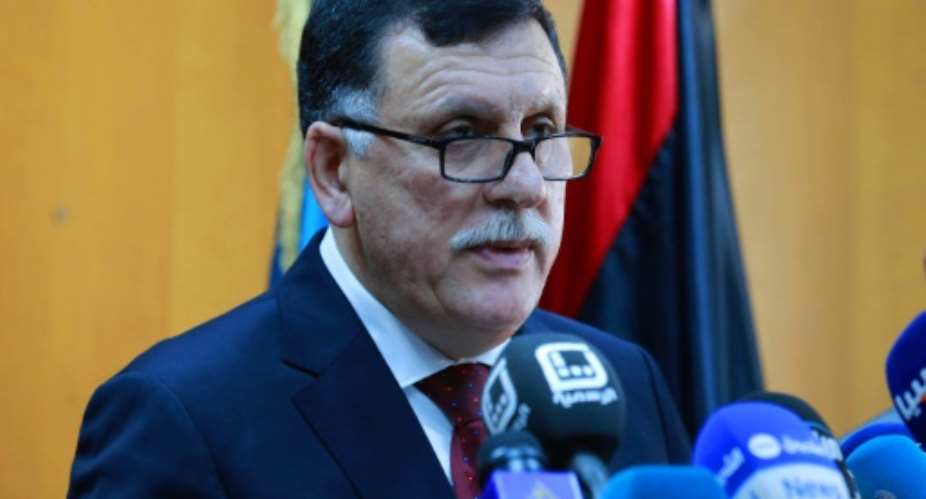 Libya's UN-backed Prime Minister-designate, Fayez al-Sarraj speaks during a press conference in the capital Tripoli on March 30, 2016.  By STRINGER AFPFile