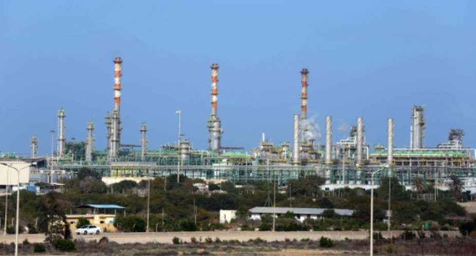 Libya's oil production has dropped from 1.5 million barrels per day bpd to around 300,000 bpd since the fall of Kadhafi.  By Mahmud Turkia AFPFile